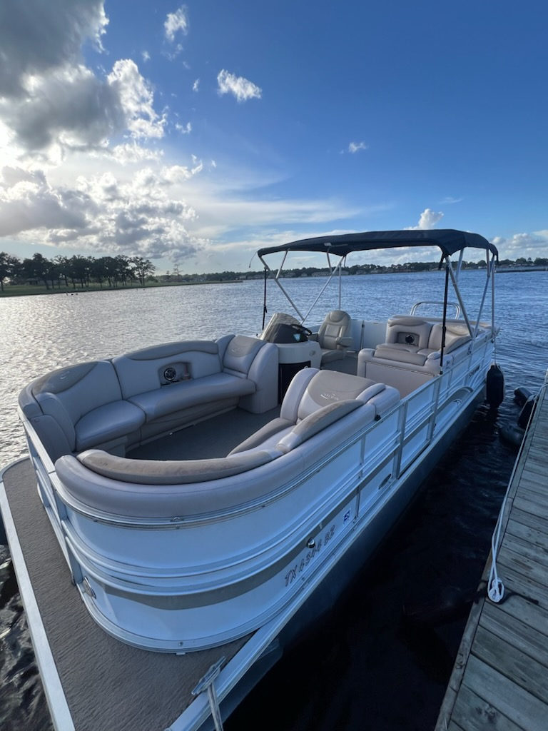 Pontoon at the dock as the sun sets
