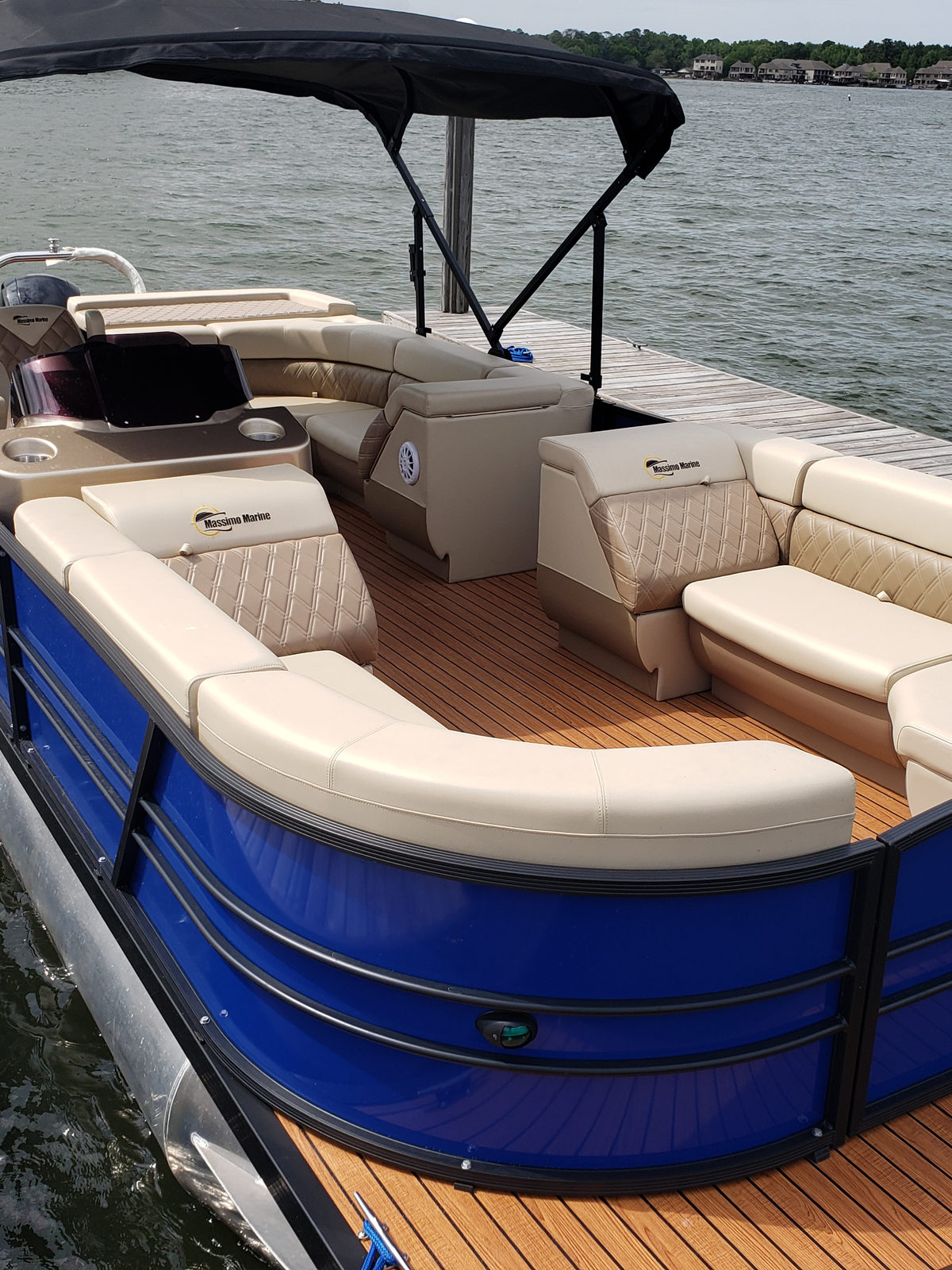 Plush tan interior of the blue tritoon
